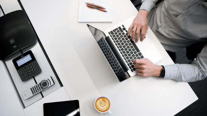 Man-writing-resignation-letter-email