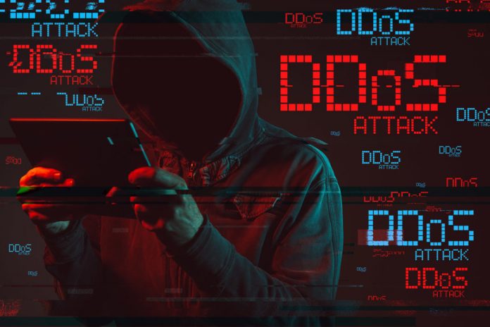 DDOS concept with faceless hooded male person